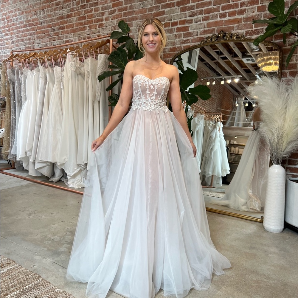 Ethereal beaded lace wedding dress from Designer boutique